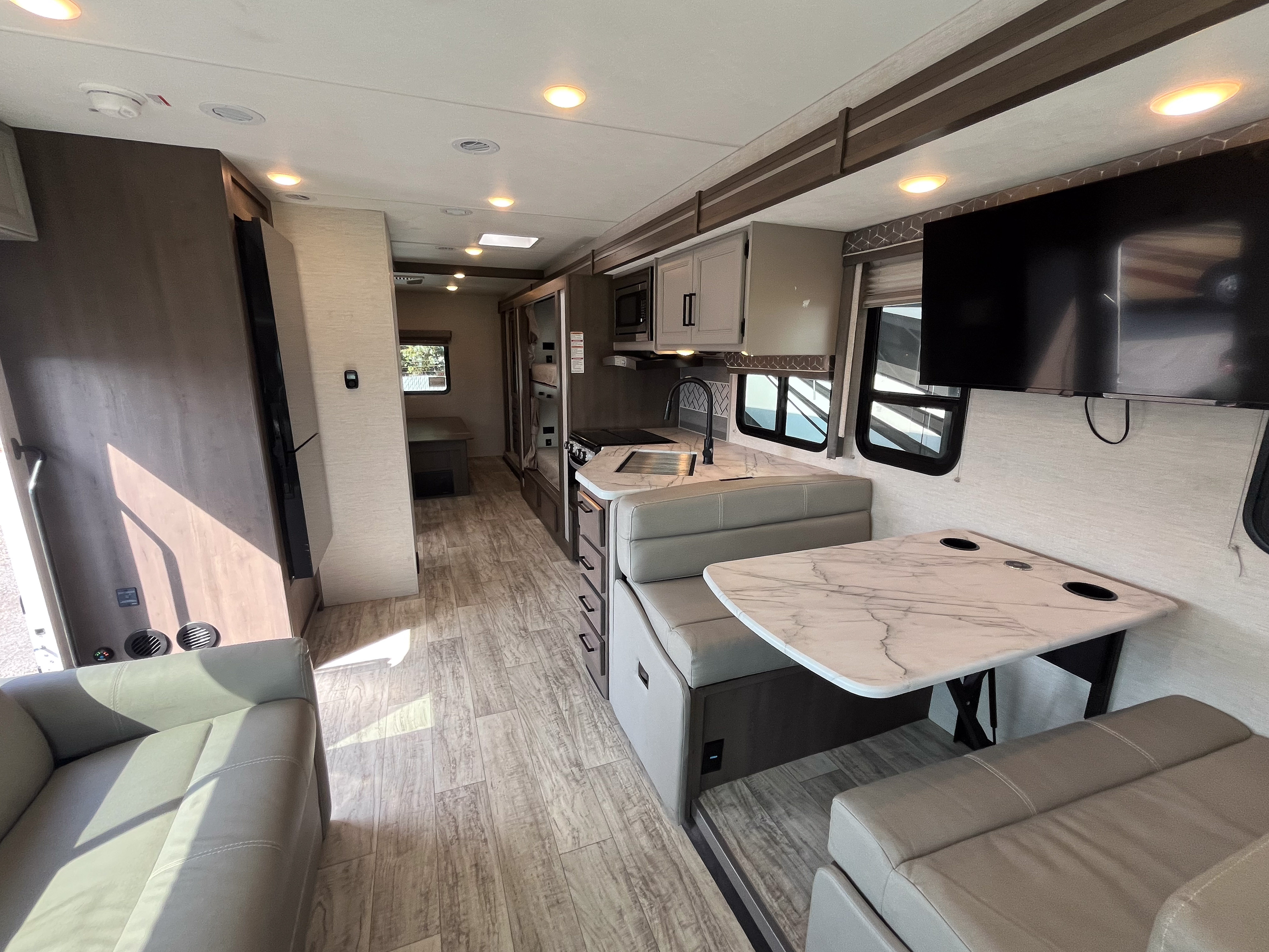 2025 Thor Freedom Traveler A32 exterior view, a spacious Class A RV perfect for family vacations from Happy Campers RV Rentals